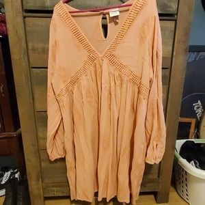Salmon colored boho dress with long sleecea